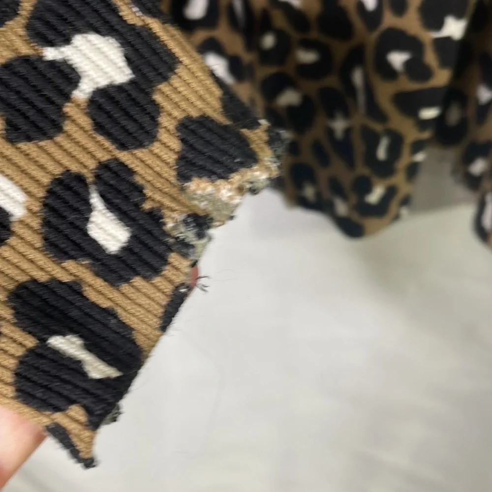 Michael Kors animal print, brown black white sweater, distressed reversible